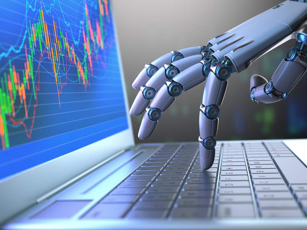 Robot,Hand,,Ordering,On,A,Laptop,Keyboard,,An,Exchange,Trade.